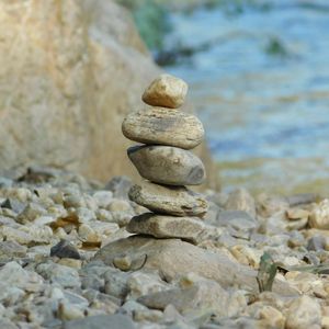Stack of smooth river stones balanced on each other